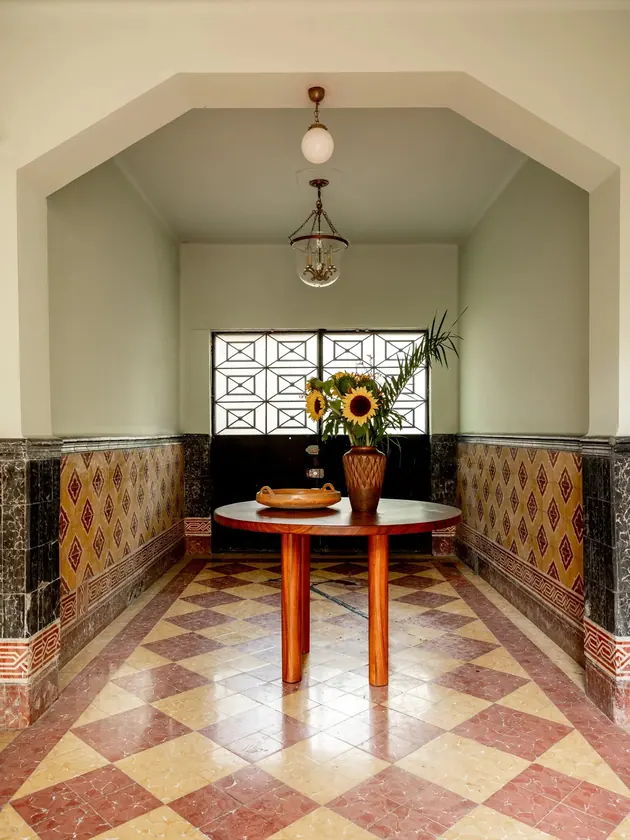 Casa de Reunión: geometric tile vestibule