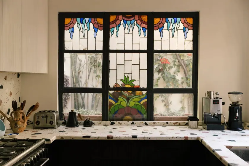Casa de Reunión: stained glass kitchen