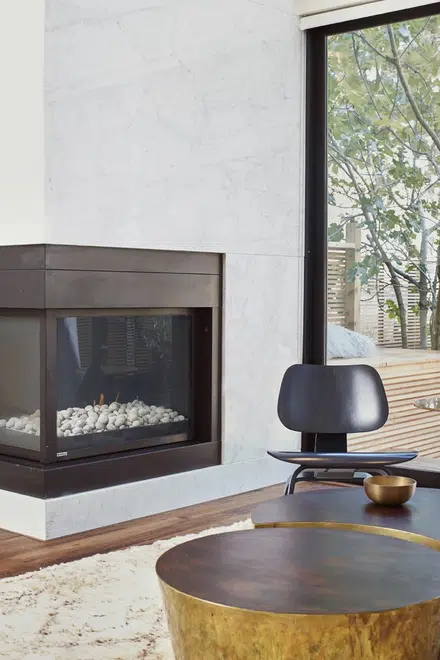 Grove Street Residences: Fireplace + Blue Chair