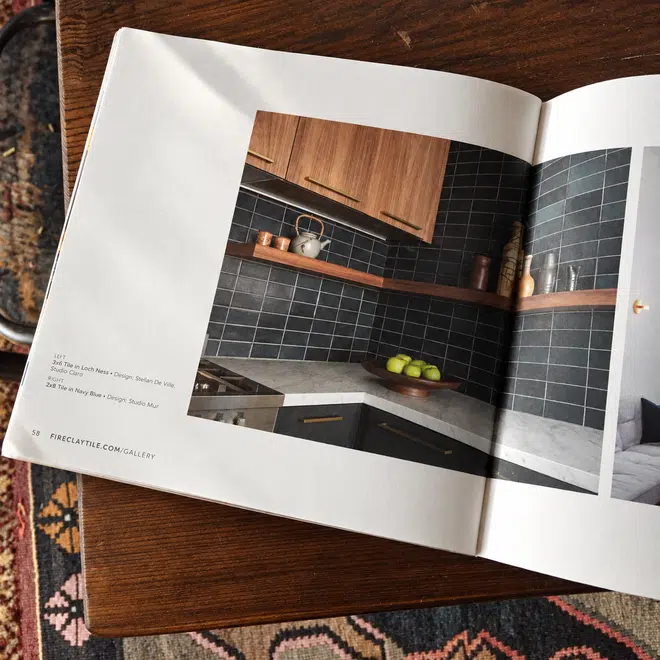 Grove Street Residences: Open architectural magazine on dark timber table 1